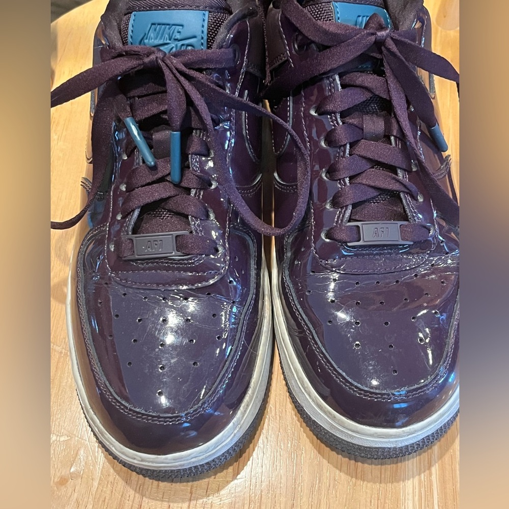Nike Air Force 1. Purple patent leather sneakers. Women’s size 8. Gently used.